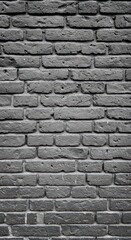 Obraz premium Detailed monochromatic surface showing the rough, uneven texture of an old gray brick wall, perfect as a grunge background, gray, empty, grey