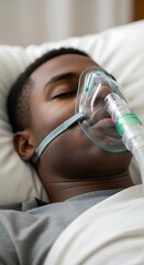 Man with Oxygen Mask Lying in Bed
