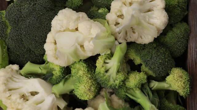 uncooked broccoli and cauliflowers florets in crate zoom texture