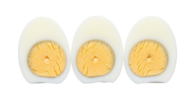 Three hard boiled egg halves isolated PNG, healthy protein food ingredient on transparent background for cooking and nutrition concepts