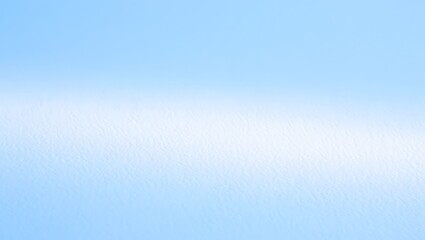 Softly blended blue sky with a wispy white cloud streak