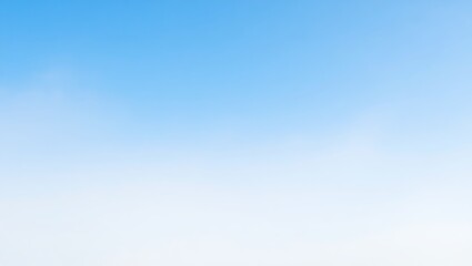 Pixelated blue sky with faint white clouds