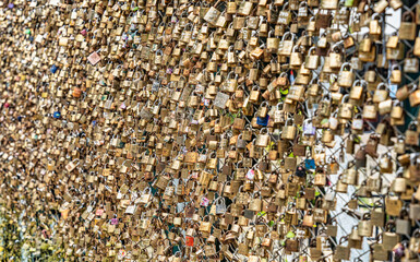 Love locks the Puente Peatonal Sinchi Roca, a pedestrian bridge in Aguas Calientes, Peru, also called the Puente del Amor (Bridge of Love).