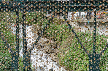 Love locks the Puente Peatonal Sinchi Roca, a pedestrian bridge in Aguas Calientes, Peru, also called the Puente del Amor (Bridge of Love).