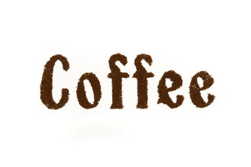 Coffee word lettering written scattered ground coffee powder background