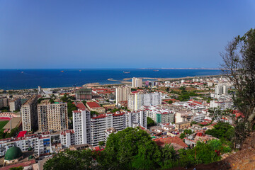 Naklejka premium Alger the capital city of Algeria, North Africa, city centre of Algiers, the capital of Algeria, Landscape of Algiers city With port and mediterranean sea and white buildings, Arab Maghreb Africa.