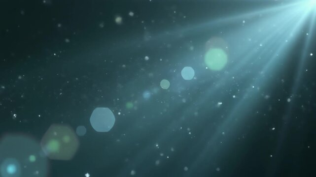 Ethereal blue light beam shining through floating particles on a dark abstract background