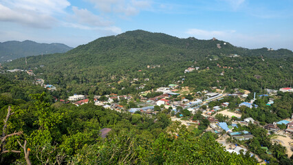 Ko Tao island village view with green hills and tropical landscape, Surat Thani, Thailand, Southeast Asia.
