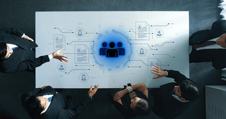 Concept of a digital human resources platform for workforce management. An applicant tracking system helps in team building by organizing employee and candidate profiles. Fermion