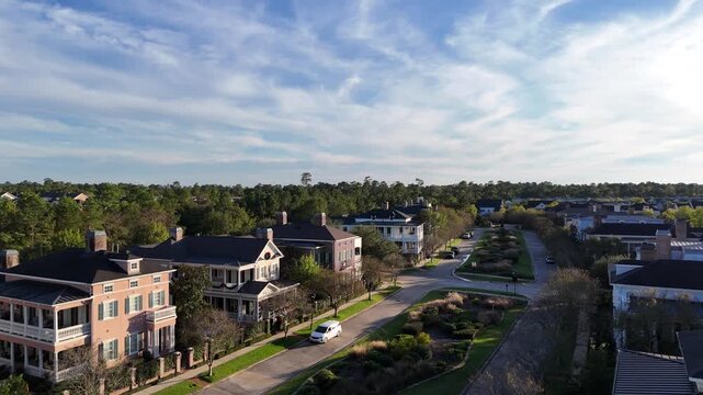 Large mansion houses with swimming pool, in affluent neighborhood metroplex, expensive suburban homes surrounding by lush green trees, aerial view, Texas, USA