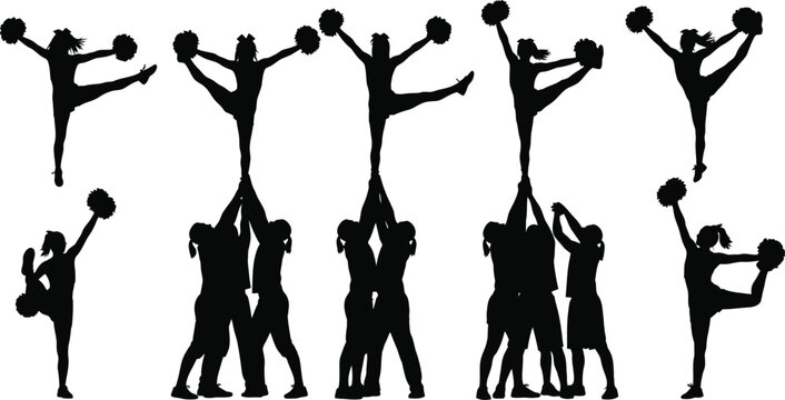 Silhouette of cheerleaders performing stunts and poses in a group