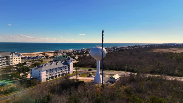 Cinematic Aerial Orbit on Water Tower and Communications Mast in Sandbridge, Virginia Beach