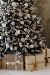 Decorated Christmas Tree with Gifts and Warm Holiday Lights