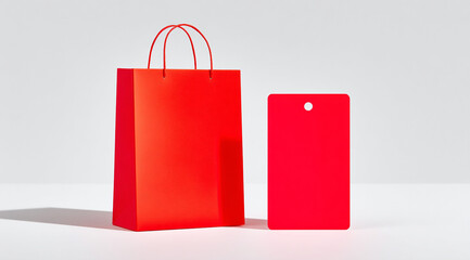 A red shopping bag on a white background. Canadian Boxing Day Shopping