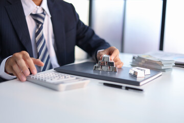 Silver Trading Businessman invest in trading silver, calculating profit price of  buying and selling silver in the market.