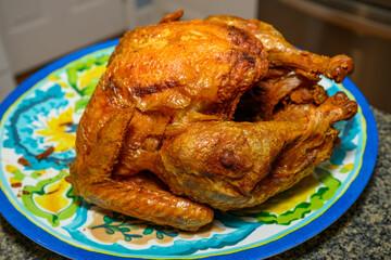 Deep fried turkey on decorative platter