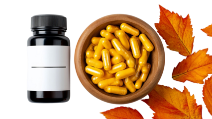 PNG of Black bottle of capsules with yellow contents beside a wooden bowl filled with more yellow capsules, framed by autumn leaves.