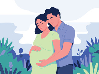 Man embracing pregnant woman in a green dress standing in a garden with blue foliage