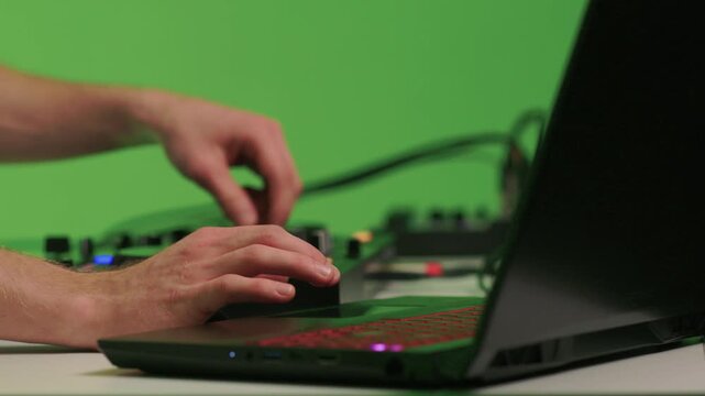 DJ setup overview, Energetic club DJ performing with digital controller in action, Content creator mixing music live using digital turntables under vibrant stage lights
