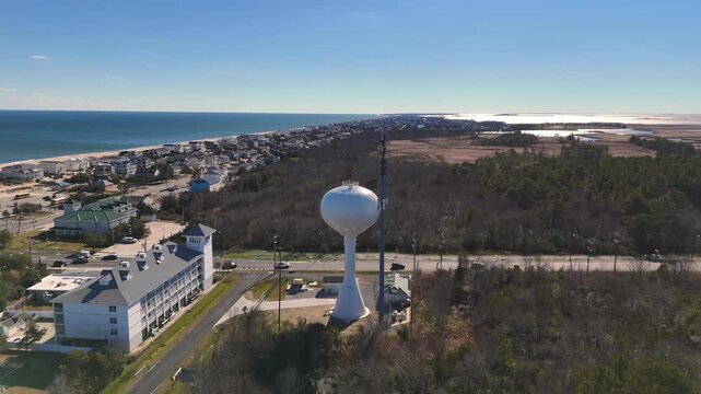 Cinematic Aerial Orbit on Water Tower and Communications Mast in Sandbridge, Virginia Beach