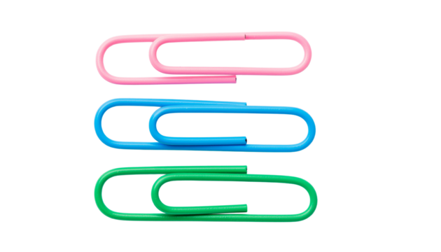 Three paper clips, one pink, one blue, and one green, are stacked vertically on top of each other in a row. no background