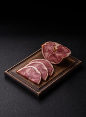 A meat roll made from pork or beef tongue slices with spices. Tongue roll