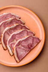 A meat roll made from pork or beef tongue slices with spices. Tongue roll