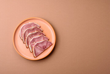 A meat roll made from pork or beef tongue slices with spices. Tongue roll