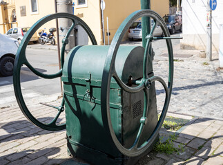 Green machine with wheels on the ground