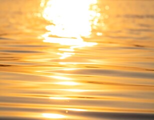 Gleaming, undulating water surface catches bright light, creating a warm, soft, abstract pattern