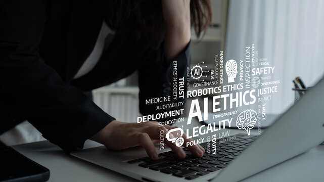 Close-up of human hands on a laptop keyboard with ethereal words related to AI ethics, technology governance, and policy, emphasizing modern challenges in the digital age. Tessel