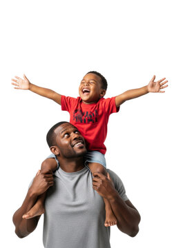 African american father in a gray t-shirt giving his ecstatic son in a red tee a shoulder ride, laughing intensely against a clean white studio background. Concept of joyful fatherhood and family love