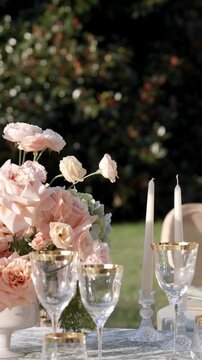 evening garden celebration, charming sunset gathering featuring exquisite floral arrangements and fine dining