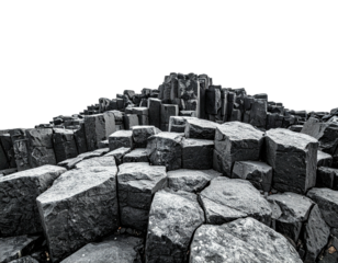 Close-up view of geometric dark gray stone columns, creating an abstract and natural landscape