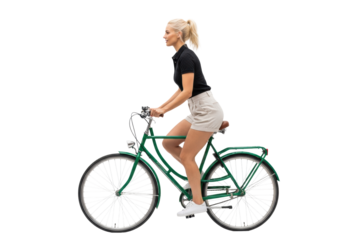 Young caucasian woman, athletic and radiant, cycling an emerald green vintage city bike in black polo and beige shorts against a clean white studio background. Concept of healthy urban transport