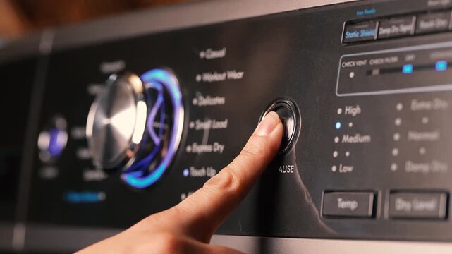 Pressing the start button on washing machine 2