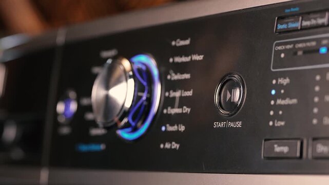 Pressing the start button on washing machine 3