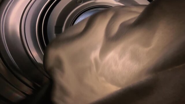 Towels tumbling inside of dryer