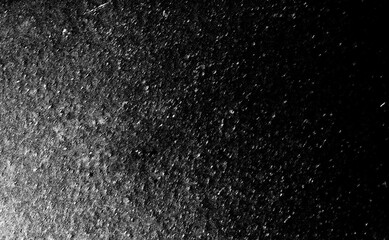 暗い黒や灰の色でセメントやコンクリートや粗い岩や石の表面をイメージしてデザインしたテクスチャ、背景、壁紙