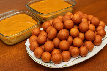 Fritters with custard ready for Christmas