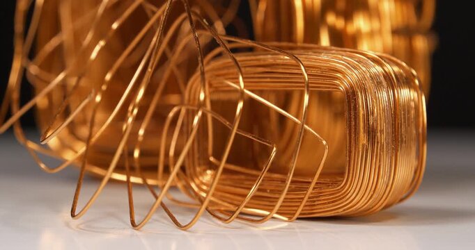 Copper windings different sizes from electric current transformers. Copper, cuprum - chemical element, non ferrous metal. Close-up shot video