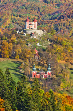 Aerial view of Calvary contrasting against the autumnal forest, a serene panorama of history and nature, Banska Stiavnica, Banskobystricka kraj, Slovakia.