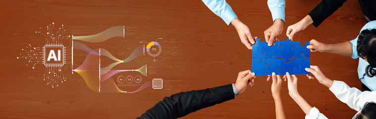 A dynamic collaborative session highlights the fusion of hands working together over a blue puzzle...