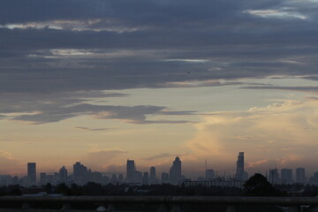 Fototapeta premium Bangkok's skyline seen during a sun raise
