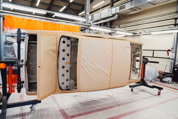 Professional anti corrosion undercoating treatment applied to hidden cavities of a car body. Long...