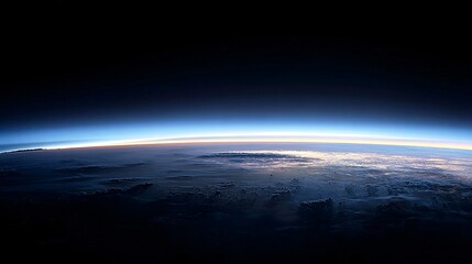 Earth horizon view from space showing atmosphere and clouds.