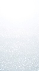 Fototapeta premium Shimmering white and light blue abstract sparkly background with glitter, like falling snow or bokeh for Christmas or New Year