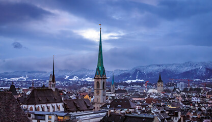 Winter cityscape with church towers after a snowfall in Zurich, Switzerland
