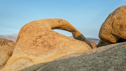 Late afternoon shadows fall on the Mobius Arch in the Alabama Hills near Lone Pine, California, USA