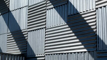 Detailed medium shot of corrugated metal sidings highlighting textured ridges and industrial aesthetic for modern exterior facades. - Powered by Adobe